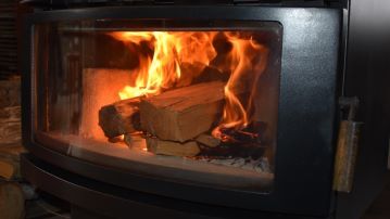 Fire burning with loofah fibers